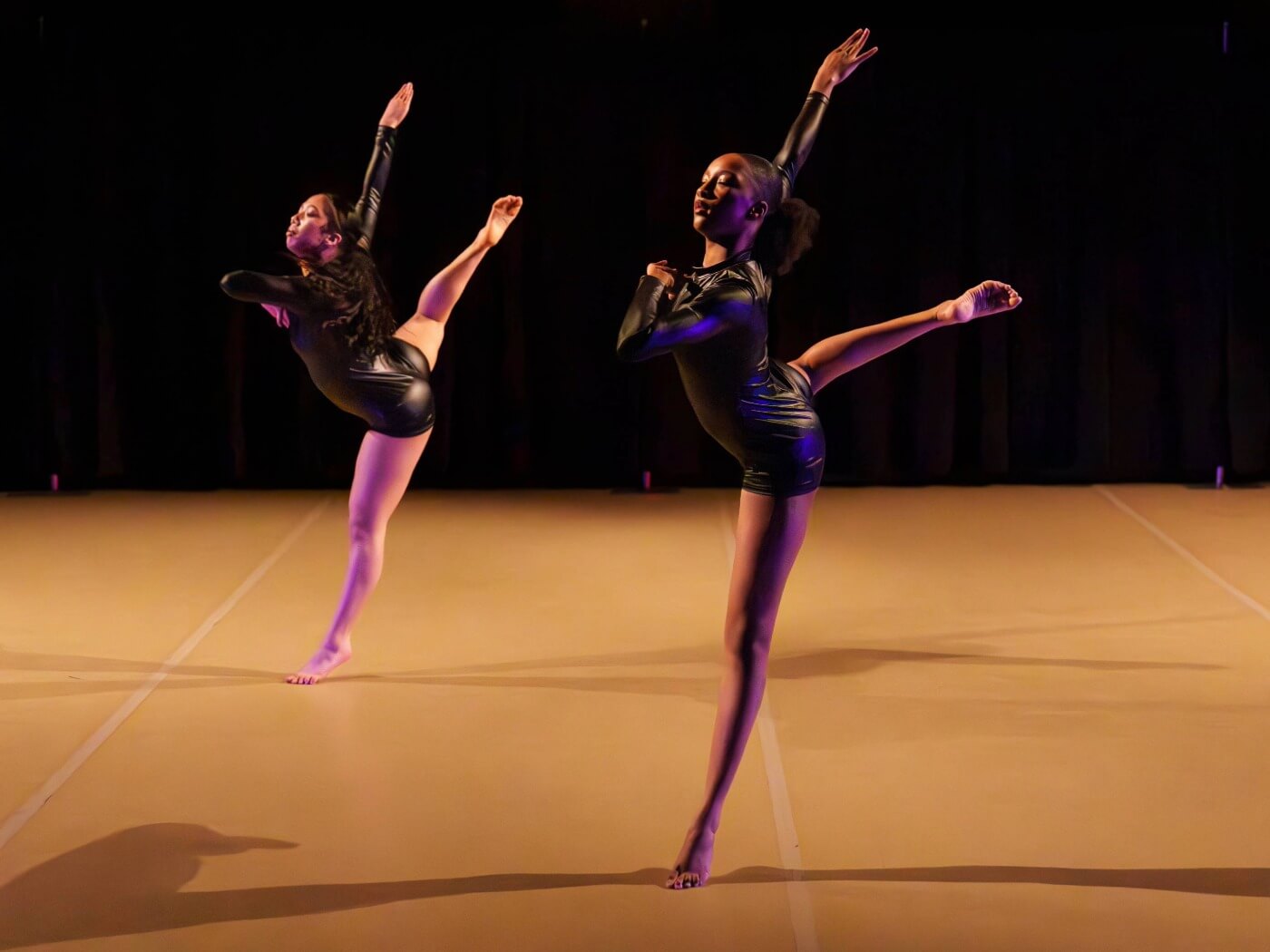 CityDance two contemporary dancers on stage